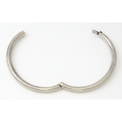 757 - Six silver and white metal bracelets to include one of bangle form with engraved decoration hallmark... 