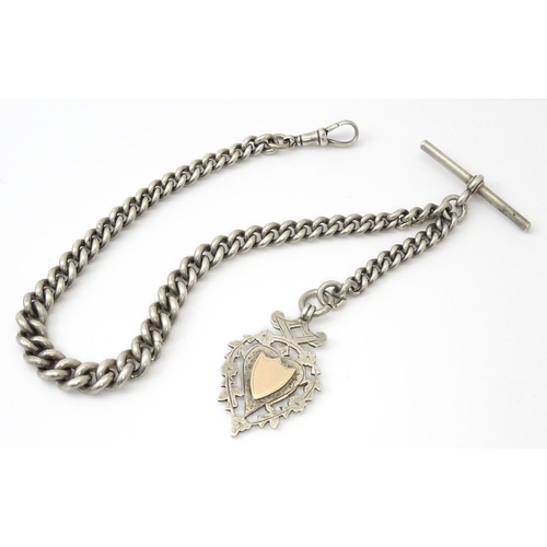 794 - A silver Albert watch chain with silver fob and T-bar. Chain approx. 13 1/2