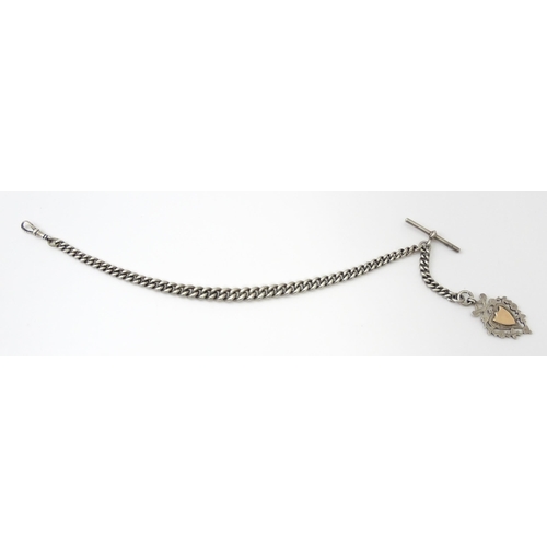 794 - A silver Albert watch chain with silver fob and T-bar. Chain approx. 13 1/2