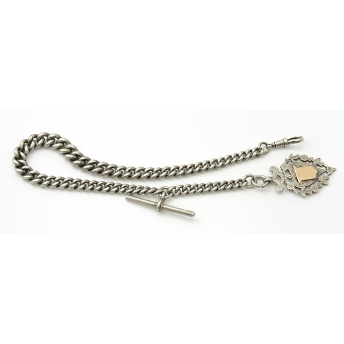 794 - A silver Albert watch chain with silver fob and T-bar. Chain approx. 13 1/2