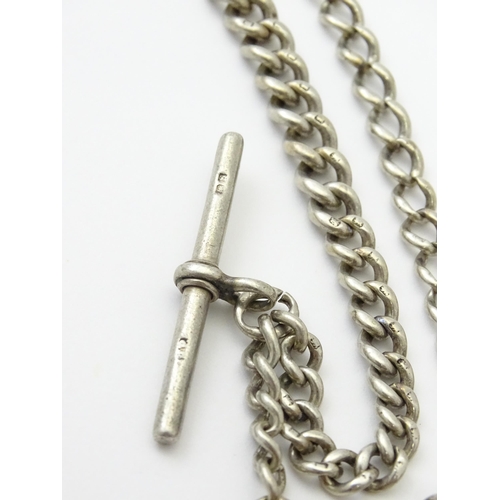 795 - A silver Albert watch chain with silver fob and T-bar. Approx. chain approx. 11