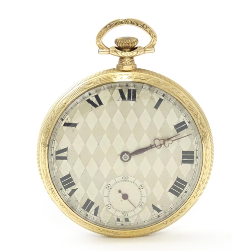 798 - A 9ct gold top wind pocket watch with Roman numerals and subsidiary Arabic seconds dial. The Case be... 