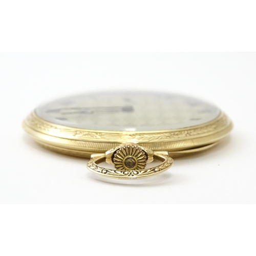 798 - A 9ct gold top wind pocket watch with Roman numerals and subsidiary Arabic seconds dial. The Case be... 