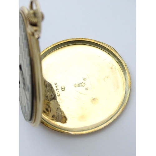 798 - A 9ct gold top wind pocket watch with Roman numerals and subsidiary Arabic seconds dial. The Case be... 