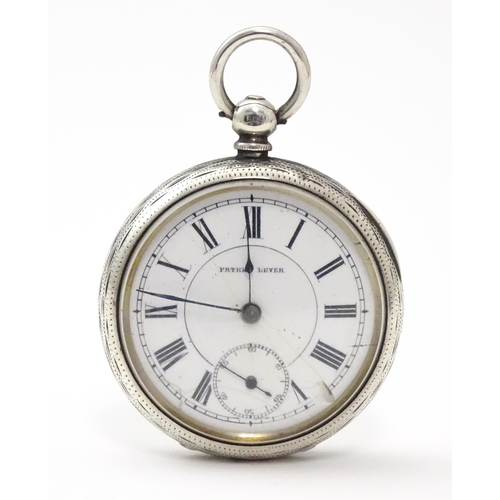 800 - A Victorian silver cased pocket / fob watch with engraved decoration hallmarked Birmingham 1886. App... 