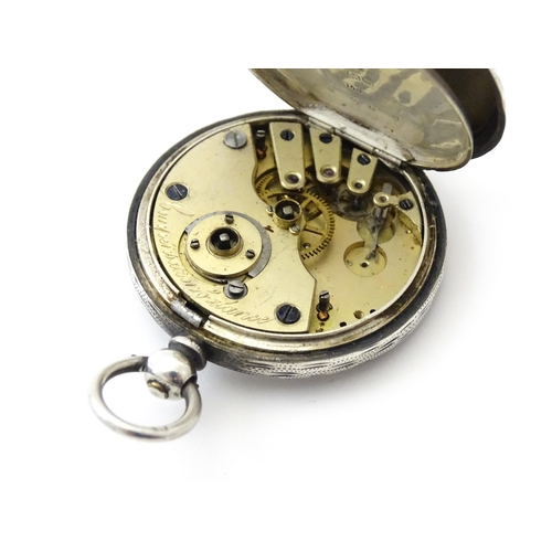 800 - A Victorian silver cased pocket / fob watch with engraved decoration hallmarked Birmingham 1886. App... 