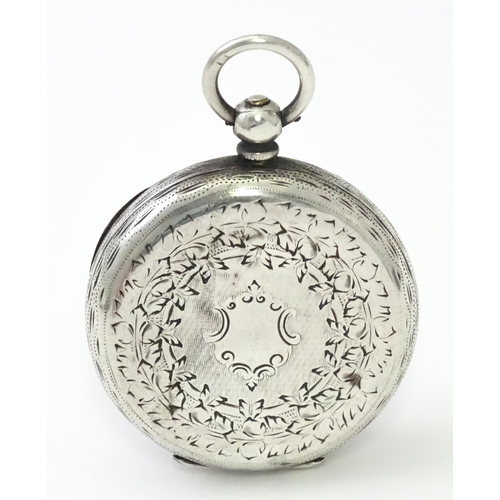 800 - A Victorian silver cased pocket / fob watch with engraved decoration hallmarked Birmingham 1886. App... 