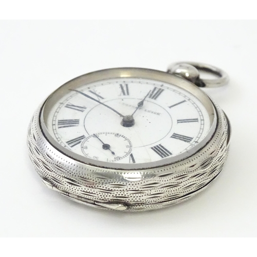 800 - A Victorian silver cased pocket / fob watch with engraved decoration hallmarked Birmingham 1886. App... 