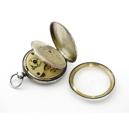 800 - A Victorian silver cased pocket / fob watch with engraved decoration hallmarked Birmingham 1886. App... 