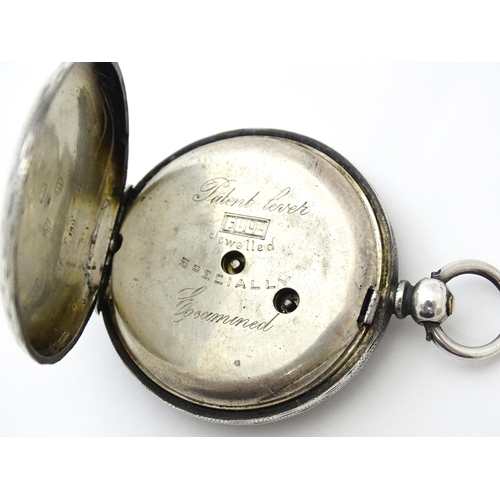 800 - A Victorian silver cased pocket / fob watch with engraved decoration hallmarked Birmingham 1886. App... 