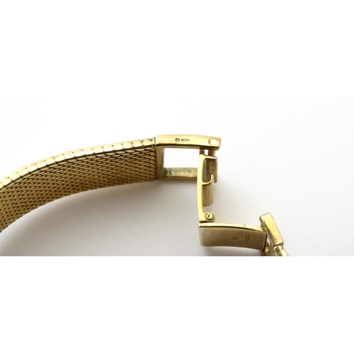 806 - A 9ct gold cased ladies wristwatch by Bueche-Girod, with 9ct gold strap. Watch approx. 7/8