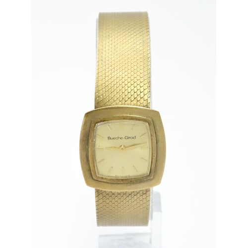 806 - A 9ct gold cased ladies wristwatch by Bueche-Girod, with 9ct gold strap. Watch approx. 7/8