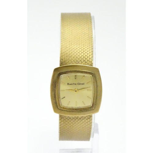 806 - A 9ct gold cased ladies wristwatch by Bueche-Girod, with 9ct gold strap. Watch approx. 7/8