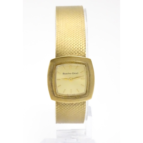 806 - A 9ct gold cased ladies wristwatch by Bueche-Girod, with 9ct gold strap. Watch approx. 7/8