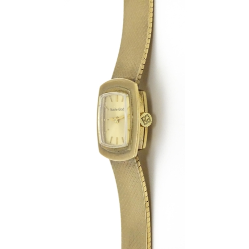 806 - A 9ct gold cased ladies wristwatch by Bueche-Girod, with 9ct gold strap. Watch approx. 7/8