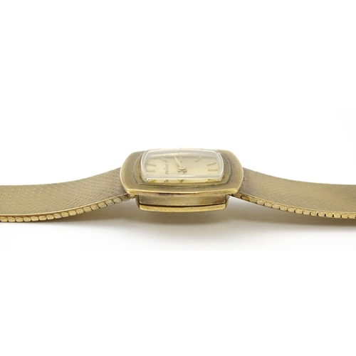 806 - A 9ct gold cased ladies wristwatch by Bueche-Girod, with 9ct gold strap. Watch approx. 7/8