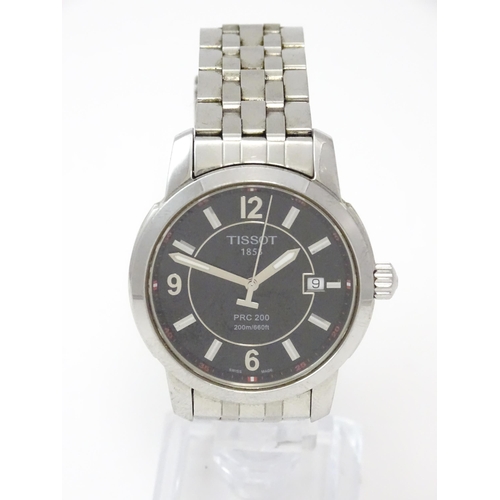 814 - A Tissot PPRC 2000 gentleman's stainless steel wristwatch, with black dial and date aperture. With b... 