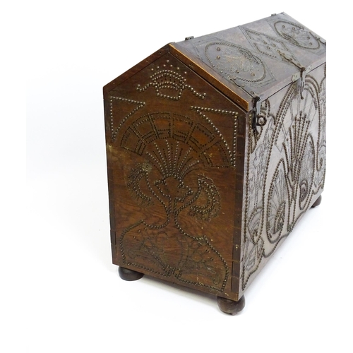 1476 - A large late 19thC Anglo-Indian oak casket / dowry chest with brass stud detailing depicting peacock... 