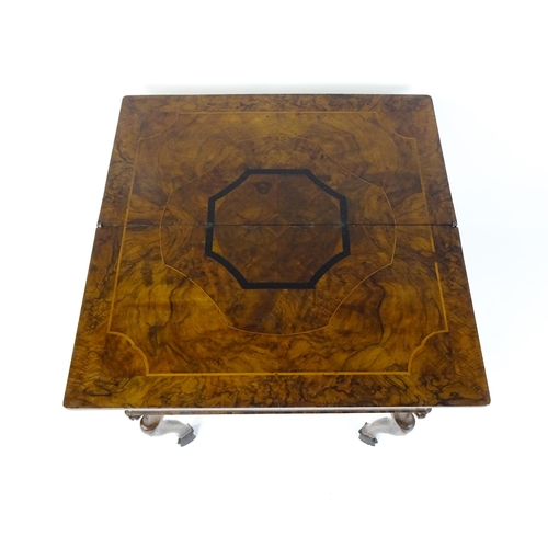 1494 - A late 18thC / early 19thC metamorphic card table of burr walnut, rosewood and mahogany construction... 