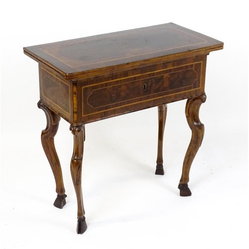 1494 - A late 18thC / early 19thC metamorphic card table of burr walnut, rosewood and mahogany construction... 