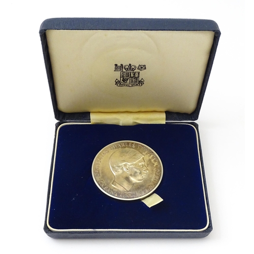 835 - A hallmarked silver 1969 Prince of Wales investiture medal, with original box. (Approx. 70g)