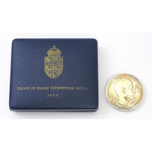 835 - A hallmarked silver 1969 Prince of Wales investiture medal, with original box. (Approx. 70g)