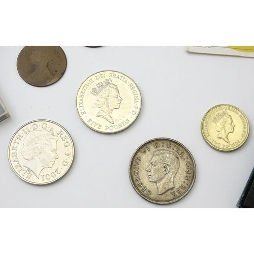 838 - Coins : A quantity of assorted coins / commemorative coins to include a 1970 set of coins of Great B... 