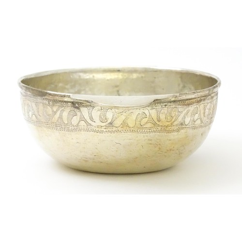 347 - A mid 20thC white metal bowl with twin handles. Possibly Indian together with a mother of pearl cham... 