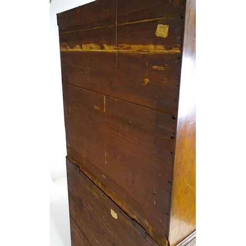 1443 - An early 19thC mahogany secretaire bookcase with an astragal glazed bookcase above a single secretai... 