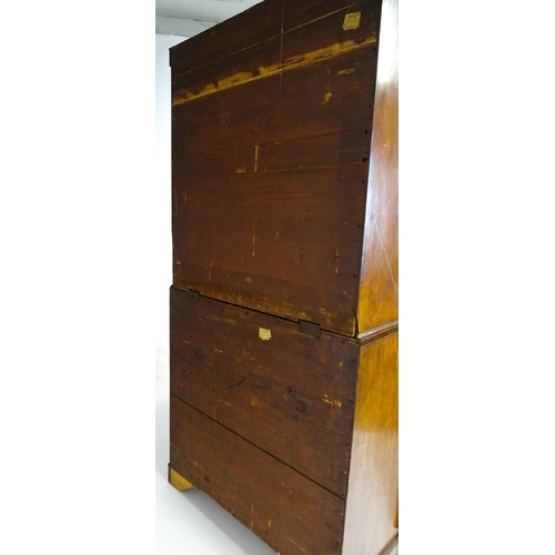 1443 - An early 19thC mahogany secretaire bookcase with an astragal glazed bookcase above a single secretai... 