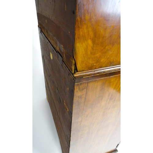 1443 - An early 19thC mahogany secretaire bookcase with an astragal glazed bookcase above a single secretai... 