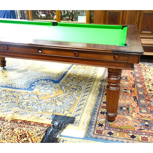 1492 - A late 20thC billiards / pool and dining table by Halstead, England, together with cues, balls and e... 