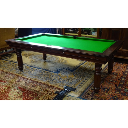 1492 - A late 20thC billiards / pool and dining table by Halstead, England, together with cues, balls and e... 