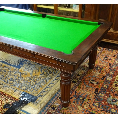 1492 - A late 20thC billiards / pool and dining table by Halstead, England, together with cues, balls and e... 