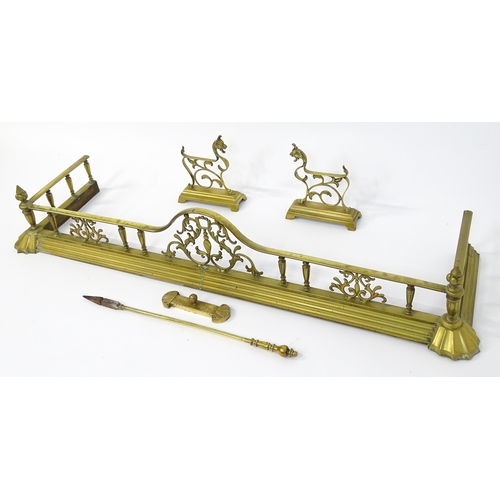 1299 - A 19thC brass fire fender, the gallery with acanthus decoration and spear terminals above a stepped ... 