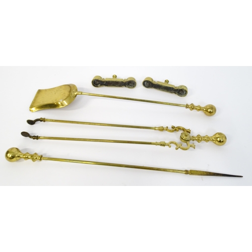 1301 - A set of three brass fire tools with ball terminals, comprising tongs, poker and shovel, together wi... 