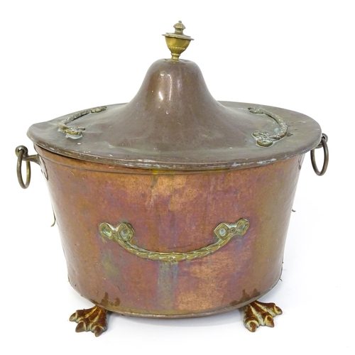 1302 - A late 19thC copper and brass coal bucket, of tapering oval form with lid, ring handles and removabl... 