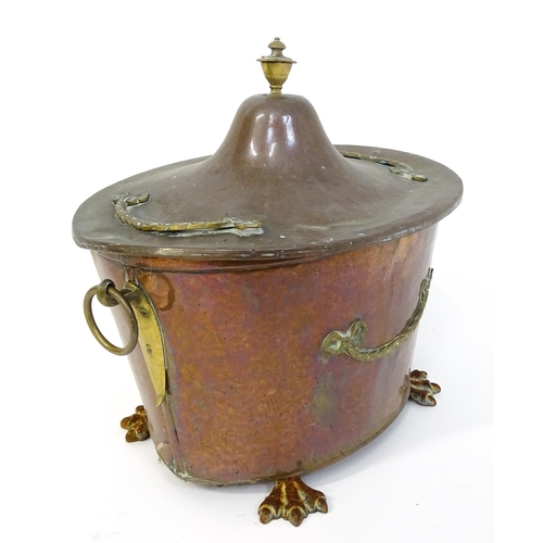 1302 - A late 19thC copper and brass coal bucket, of tapering oval form with lid, ring handles and removabl... 