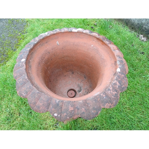 1308 - A late 20thC two-piece terracotta garden planter formed as classical urn, approx 32