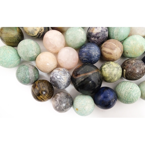 1073 - Natural History / Geology Interest: A quantity of polished hardstone specimen spheres, examples to i... 