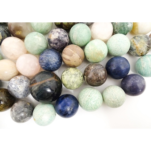 1073 - Natural History / Geology Interest: A quantity of polished hardstone specimen spheres, examples to i... 