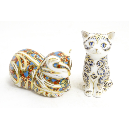 114 - Two Royal Crown Derby paperweights modelled as cats, one a limited edition example titled Majestic K... 