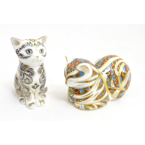 114 - Two Royal Crown Derby paperweights modelled as cats, one a limited edition example titled Majestic K... 