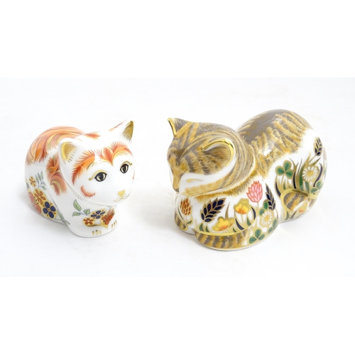 115 - Two Royal Crown Derby paperweights modelled as cats, one titled Cottage Garden Cat. Marked under. Bo... 