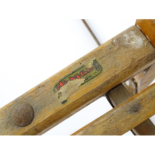 1236 - An early 20thC Norwegian kicksled. Bears remains of original label. Approx. 69