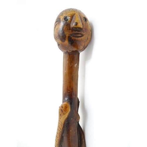 1242 - A late 19th / early 20thC hardwood walking stick / cane with folk art carved snake and lizard decora... 