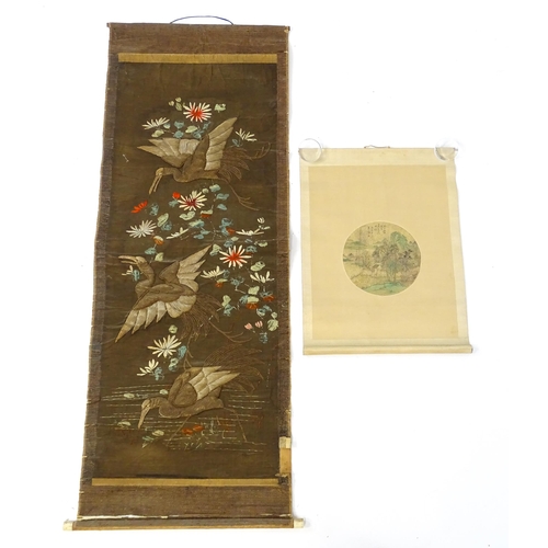 1253 - An Oriental embroidered scroll decorated with birds, flowers and foliage. Together with a Chinese sc... 