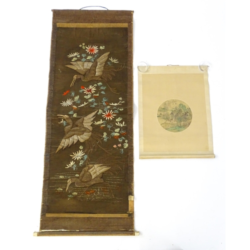 1253 - An Oriental embroidered scroll decorated with birds, flowers and foliage. Together with a Chinese sc... 