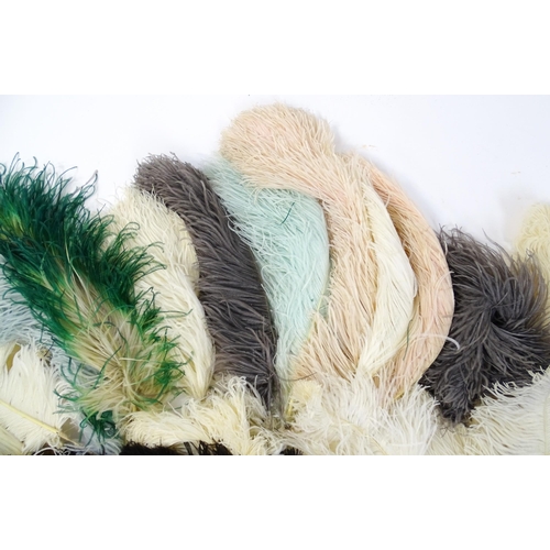 1264 - A quantity of assorted ostrich feathers, examples to include black, white, green, blue pale blue, pa... 