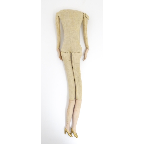 1277 - Toy: A 20thC French cloth boudoir doll body, with straw filled body and bisque hands and lower legs.... 